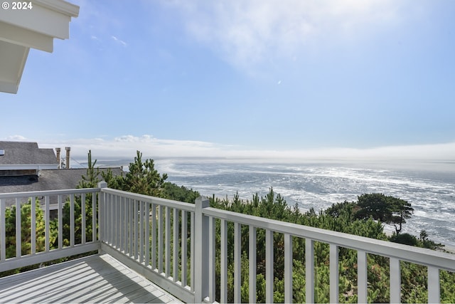 balcony featuring a water view