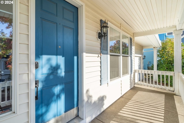 10909 SW Adele Dr, Portland, OR 97225 - doorway to property featuring covered porch
