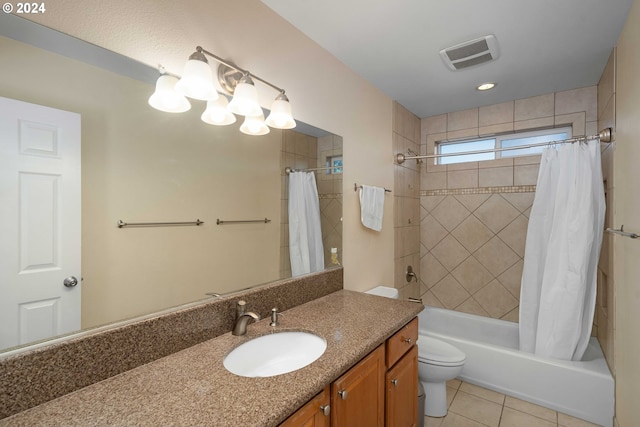 10909 SW Adele Dr, Portland, OR 97225 - full bath featuring tile patterned flooring, shower / bath combo with shower curtain, toilet, and vanity