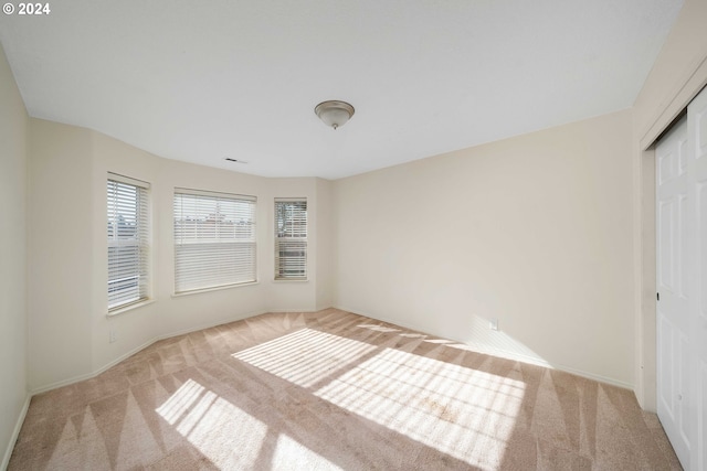 10909 SW Adele Dr, Portland, OR 97225 - unfurnished bedroom featuring carpet flooring, a closet, and baseboards