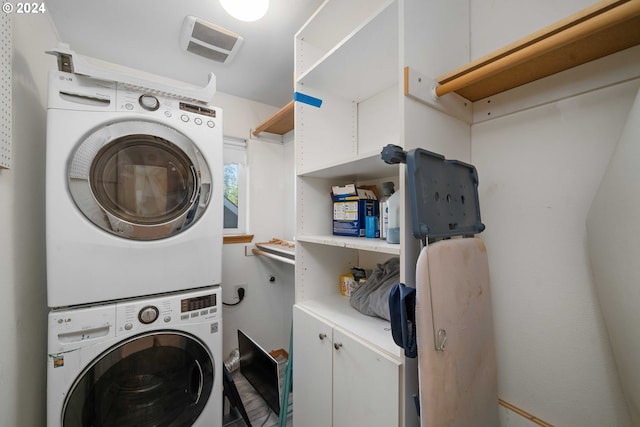 10909 SW Adele Dr, Portland, OR 97225 - washroom featuring stacked washing machine and dryer