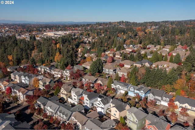 10909 SW Adele Dr, Portland, OR 97225 - aerial view of property's location featuring nearby suburban area and a heavily wooded area