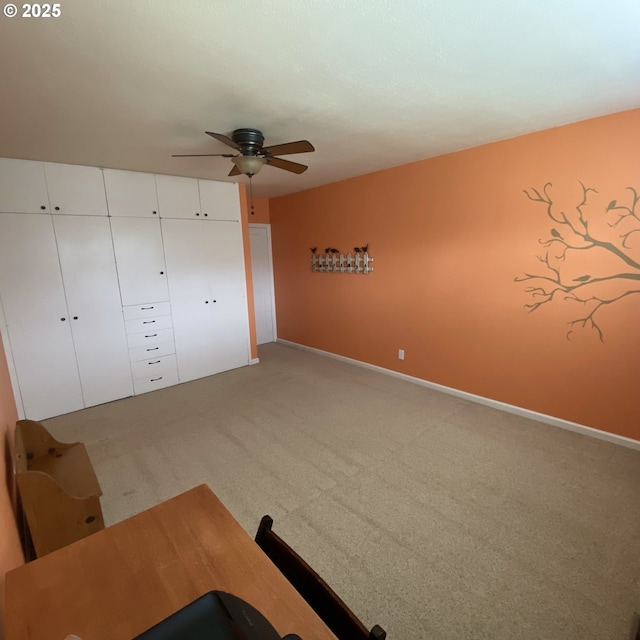 5716 Duniway Ave, Gladstone, OR 97027 - unfurnished bedroom with light carpet, baseboards, a closet, and ceiling fan