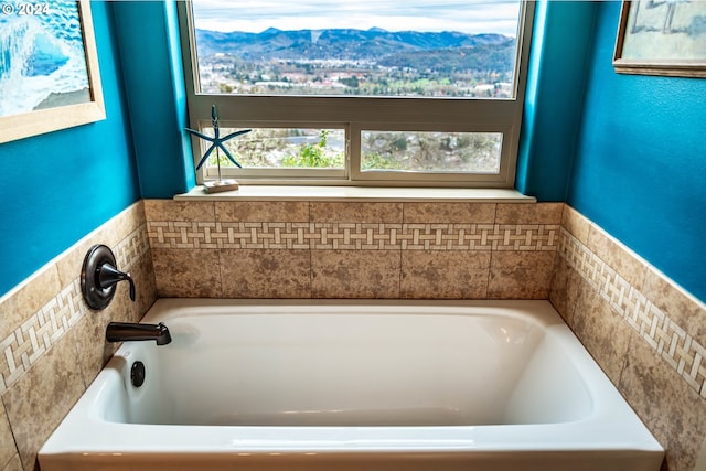 bathroom featuring a tub to relax in