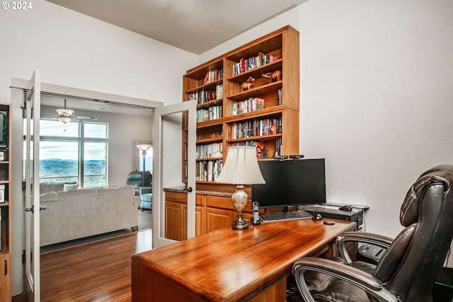 office area featuring dark hardwood / wood-style floors and ceiling fan