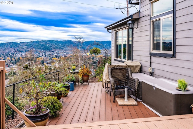 wooden terrace with a mountain view