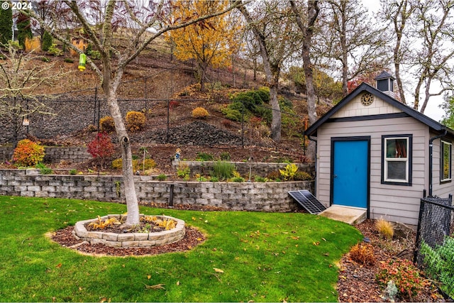 view of yard with a storage shed