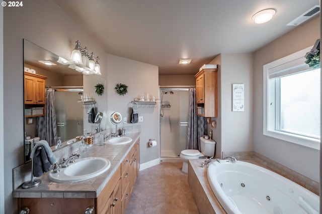 full bathroom with toilet, vanity, tile patterned flooring, and separate shower and tub