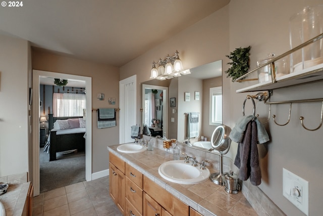 bathroom with vanity and tile patterned floors