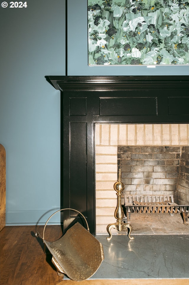 interior details featuring hardwood / wood-style floors