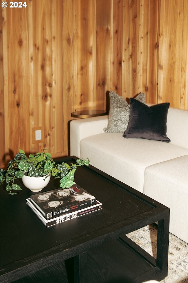 bedroom with wood walls