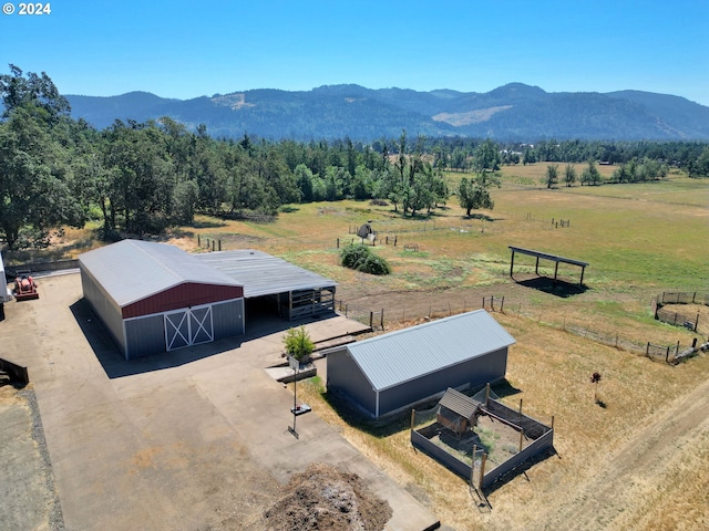 aerial view featuring a mountain view and a rural view