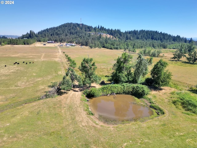 bird's eye view with a rural view and a water and mountain view