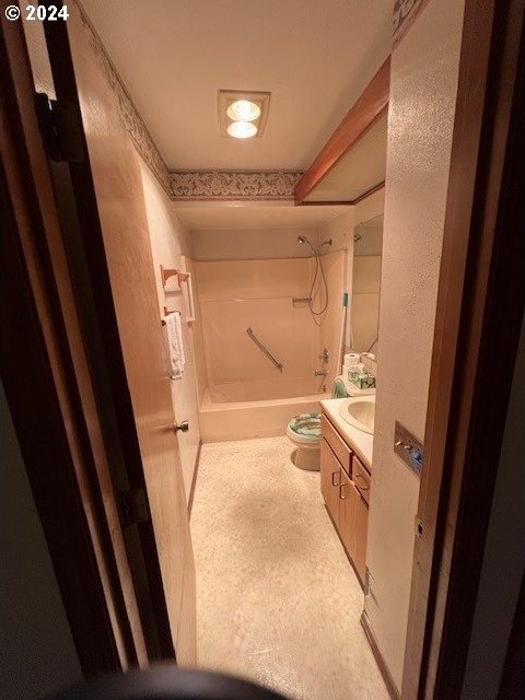 full bathroom featuring vanity, toilet, and shower / bathtub combination