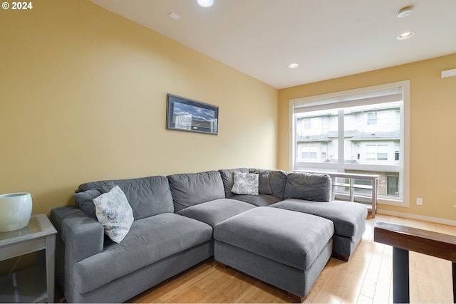 living room with light hardwood / wood-style flooring