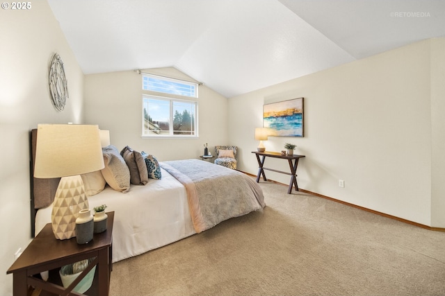 bedroom featuring lofted ceiling and carpet