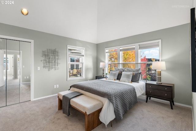 carpeted bedroom with a closet