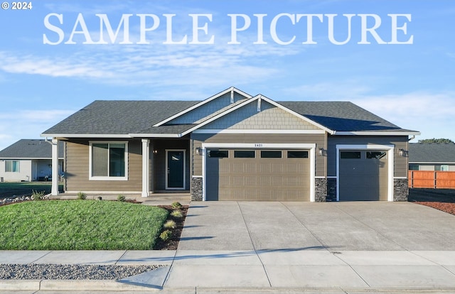 craftsman inspired home featuring a garage