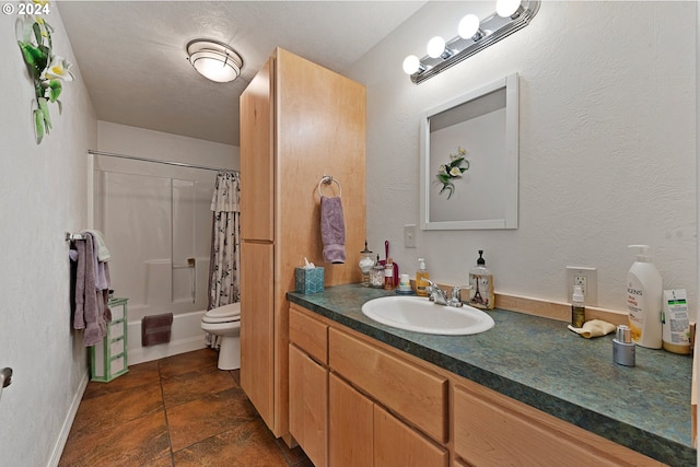 full bathroom with vanity, toilet, and shower / bath combo with shower curtain