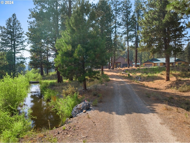 view of street with a water view