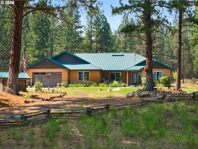 ranch-style home featuring a garage