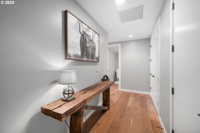 hallway with light wood-type flooring