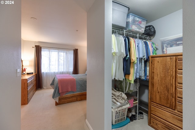 bedroom with light colored carpet