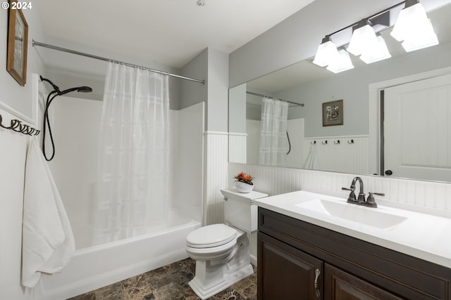 full bathroom with shower / tub combo, vanity, and toilet