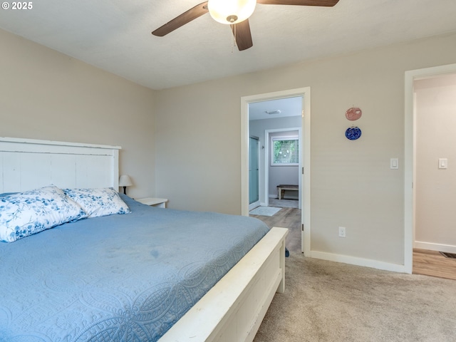 15836 SW Division St, Sherwood, OR 97140 - bedroom with light colored carpet, baseboards, and a ceiling fan