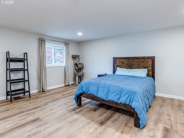 15836 SW Division St, Sherwood, OR 97140 - bedroom featuring wood finished floors, baseboards, and recessed lighting