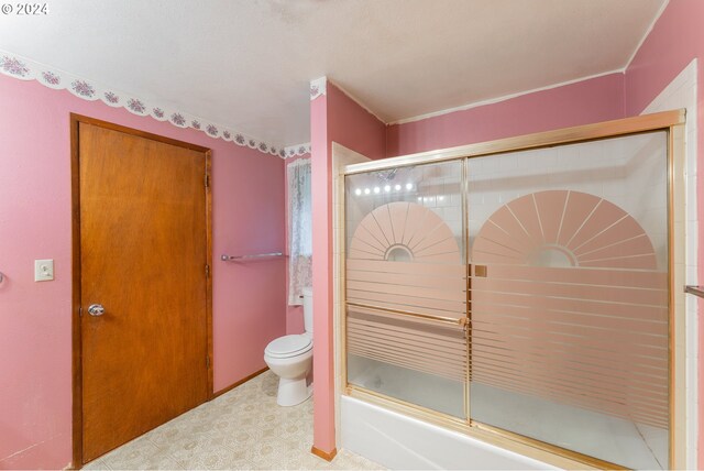 386 Longview Dr, Elkton, OR 97436 - bathroom with toilet, enclosed tub / shower combo, and tile patterned floors