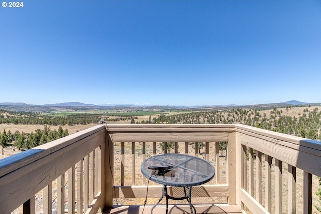 wooden terrace with a mountain view