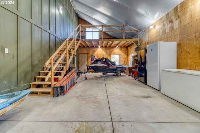 garage with white refrigerator