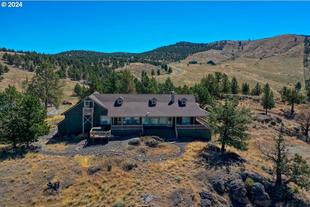 exterior space featuring a mountain view