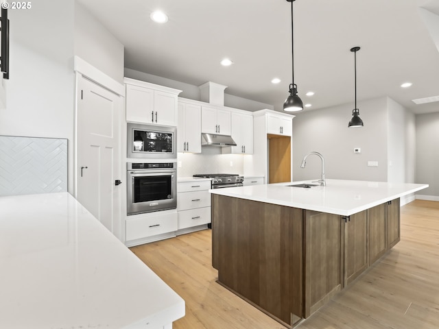 2891 NE Currin Creek Dr, Estacada, OR 97023 - kitchen with recessed lighting, white cabinetry, appliances with stainless steel finishes, and a sink