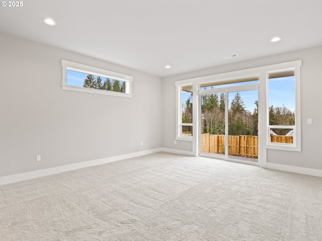 2891 NE Currin Creek Dr, Estacada, OR 97023 - spare room featuring a wealth of natural light, baseboards, carpet flooring, and recessed lighting