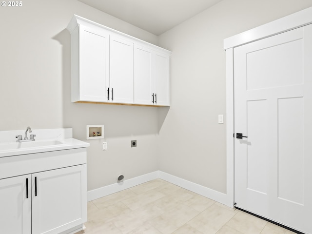2891 NE Currin Creek Dr, Estacada, OR 97023 - clothes washing area featuring baseboards, a sink, washer hookup, hookup for an electric dryer, and cabinet space