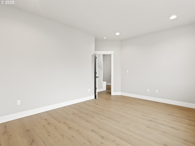 2891 NE Currin Creek Dr, Estacada, OR 97023 - spare room with light wood-style flooring, baseboards, and recessed lighting