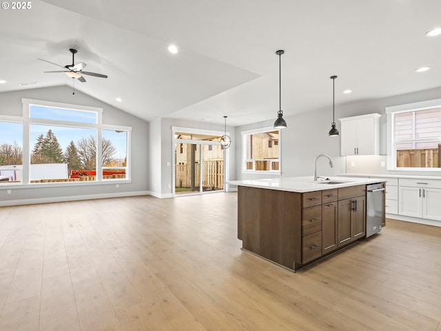 2891 NE Currin Creek Dr, Estacada, OR 97023 - kitchen featuring stainless steel dishwasher, open floor plan, a ceiling fan, and a sink