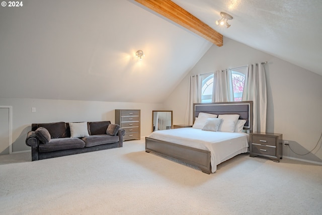 bedroom featuring lofted ceiling with beams and light colored carpet