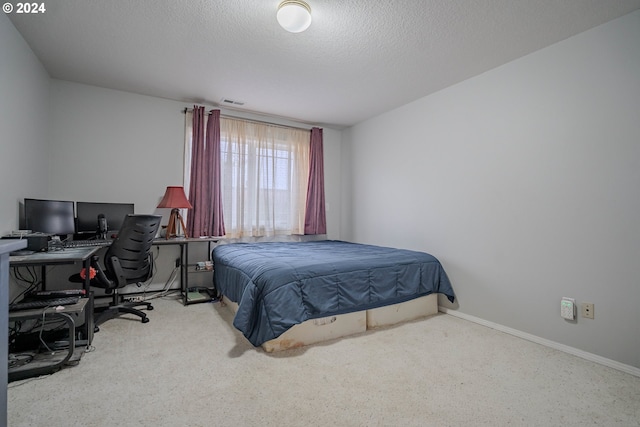 bedroom with a textured ceiling