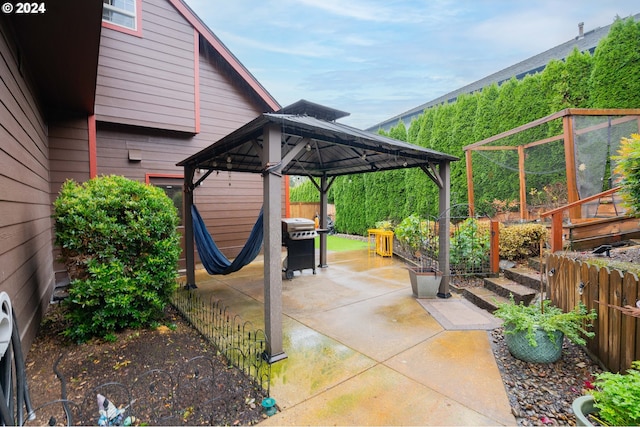 view of patio featuring a gazebo and grilling area