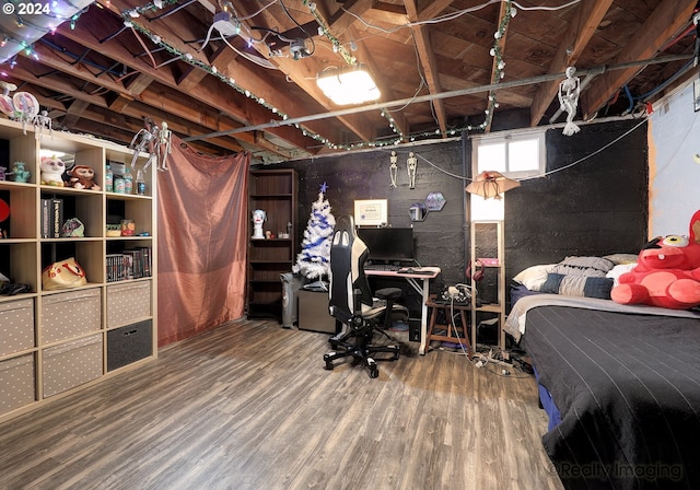 bedroom featuring hardwood / wood-style flooring