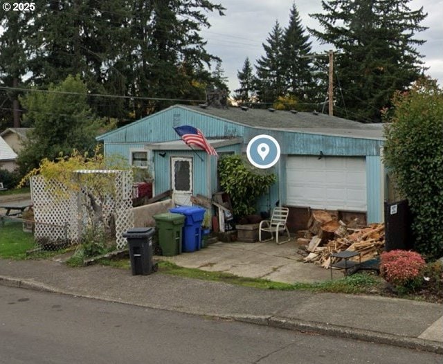 view of outbuilding with a garage