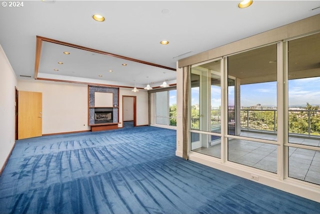 interior space featuring a large fireplace and carpet flooring