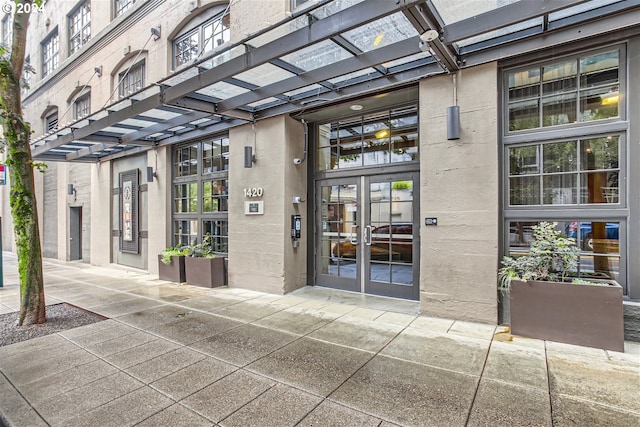 entrance to property featuring french doors