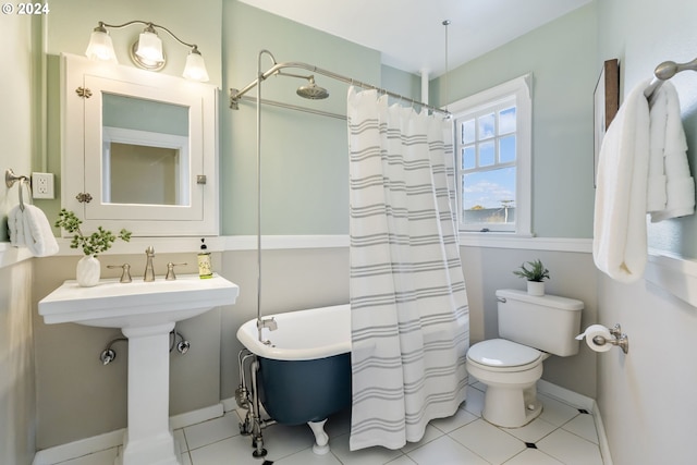 bathroom with toilet, independent shower and bath, and tile patterned floors