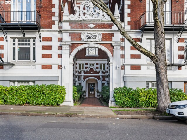 doorway to property with a balcony