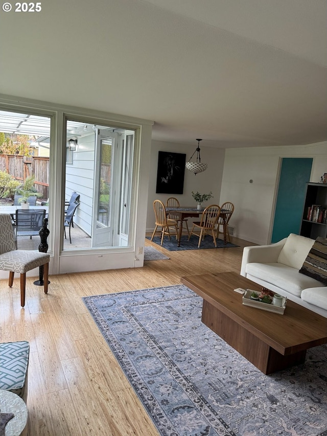 living room with light hardwood / wood-style floors