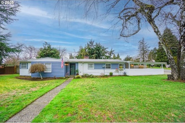 ranch-style home with a front lawn